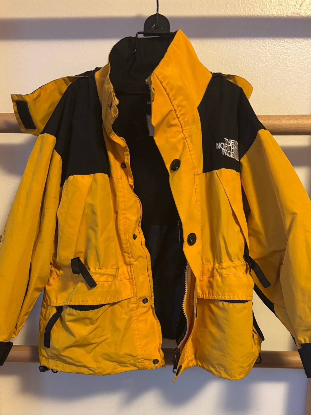 The North Face Yellow and Black Kids Raincoat